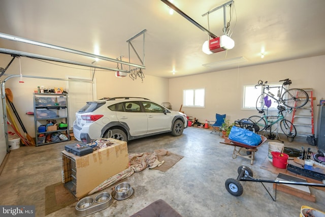 garage featuring a garage door opener