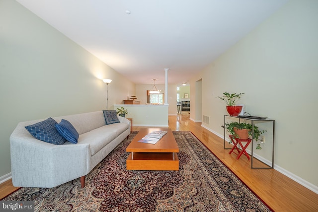 215 Valley Frg, Lookout Place, Wayne, PA 19087 - living room with wood finished floors and baseboards