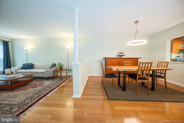 215 Valley Frg, Lookout Place, Wayne, PA 19087 - dining space featuring decorative columns, light wood-style floors, and baseboards