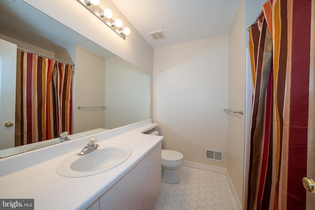 215 Valley Frg, Lookout Place, Wayne, PA 19087 - bathroom featuring toilet, vanity, baseboards, a shower with curtain, and tile patterned floors