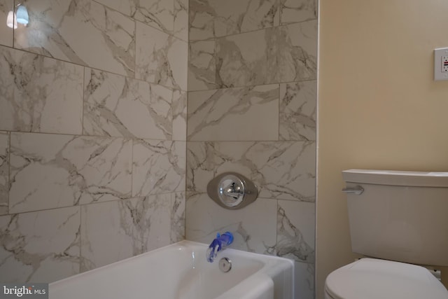 full bathroom featuring toilet and shower / washtub combination