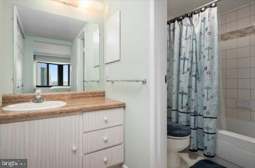 bathroom featuring toilet, vanity, and shower / bathtub combination with curtain