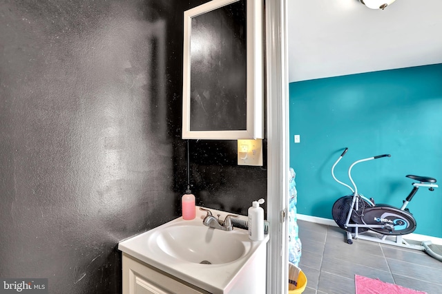 bathroom with vanity and tile patterned flooring