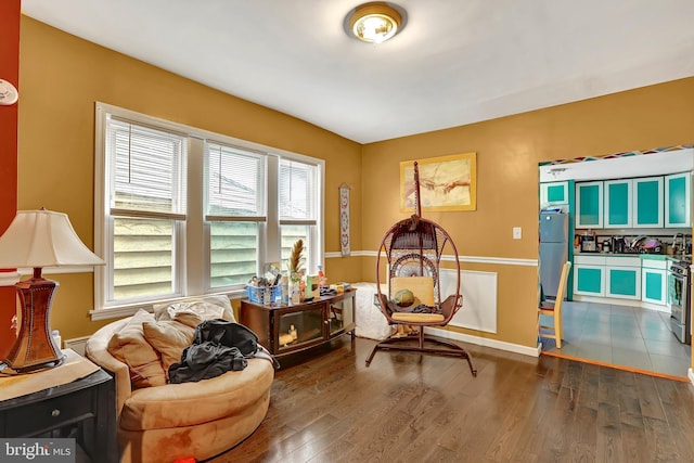 living area with dark wood-style floors