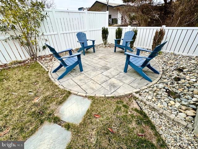 1 E Essex St, Fenwick Island, DE 19944 - view of patio / terrace with a fenced backyard