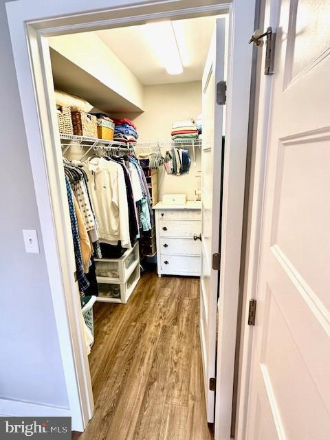 1 E Essex St, Fenwick Island, DE 19944 - walk in closet with wood finished floors