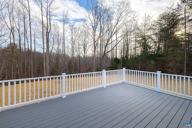 deck with a wooded view