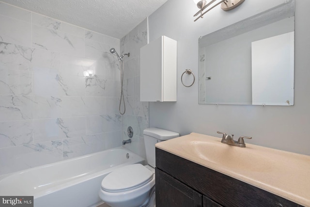 bathroom with toilet, bathtub / shower combination, vanity, and a textured ceiling