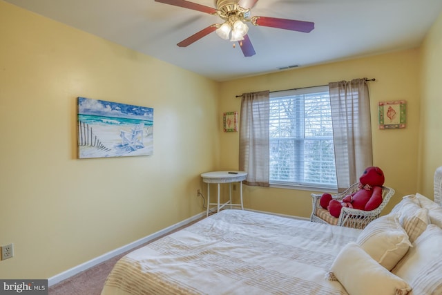 bedroom featuring visible vents, ceiling fan, carpet, and baseboards