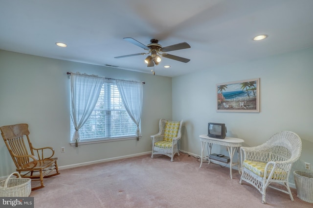 living area featuring carpet flooring, recessed lighting, baseboards, and ceiling fan