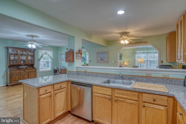 kitchen featuring a ceiling fan, light wood-style flooring, recessed lighting, a sink, and stainless steel dishwasher