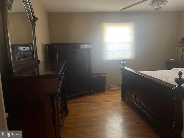 bedroom featuring light wood finished floors