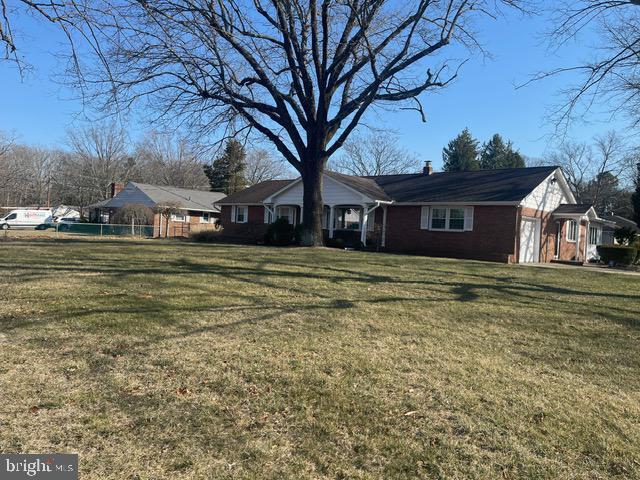 exterior space with a front yard