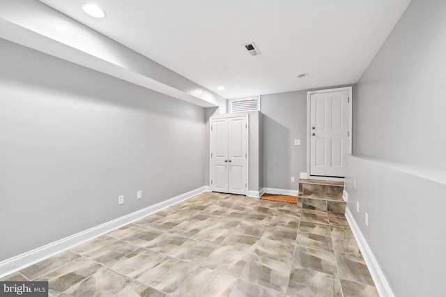 finished basement with recessed lighting, baseboards, and visible vents