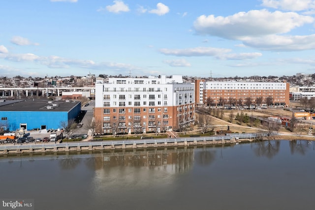 aerial view featuring a water view and a view of city