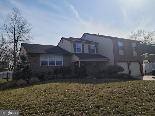 view of front of property featuring brick siding, an attached garage, a front yard, and fence