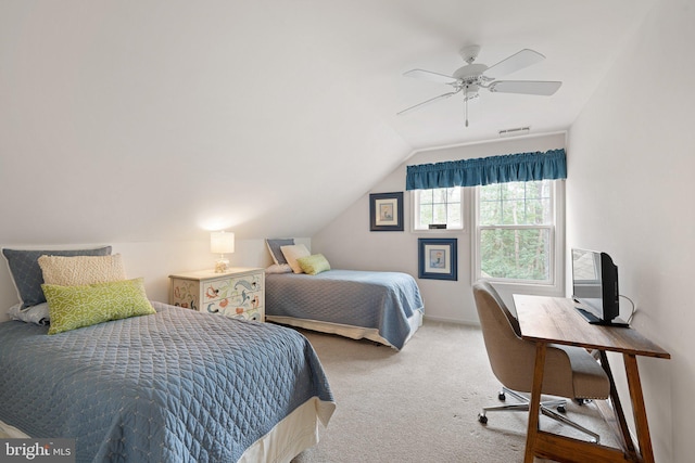 bedroom featuring visible vents, carpet floors, lofted ceiling, and a ceiling fan