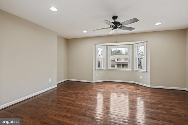 unfurnished room with recessed lighting, baseboards, a ceiling fan, and wood-type flooring