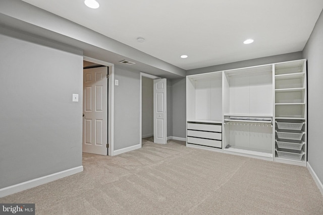 interior space with recessed lighting, carpet, and baseboards