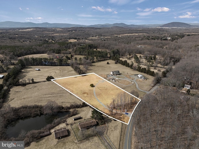 bird's eye view featuring a mountain view and a rural view