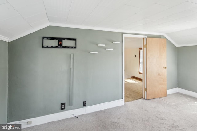 bonus room with carpet flooring, baseboards, and lofted ceiling