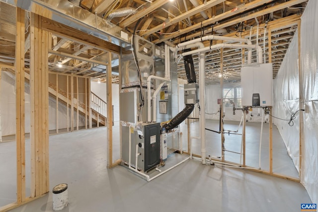 basement with heating unit and water heater