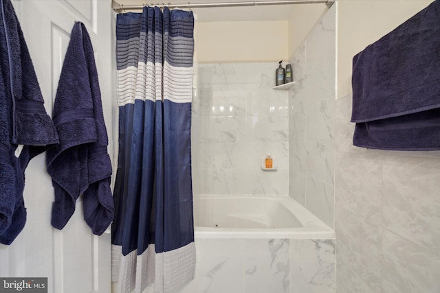 full bath featuring tiled shower / bath combo