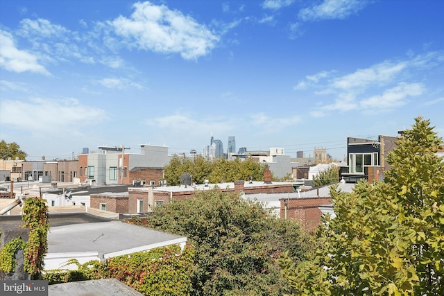 surrounding community featuring a view of city