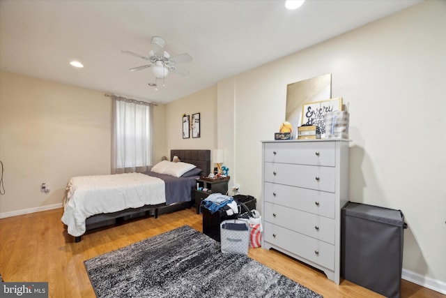 bedroom featuring recessed lighting, baseboards, light wood-style floors, and a ceiling fan