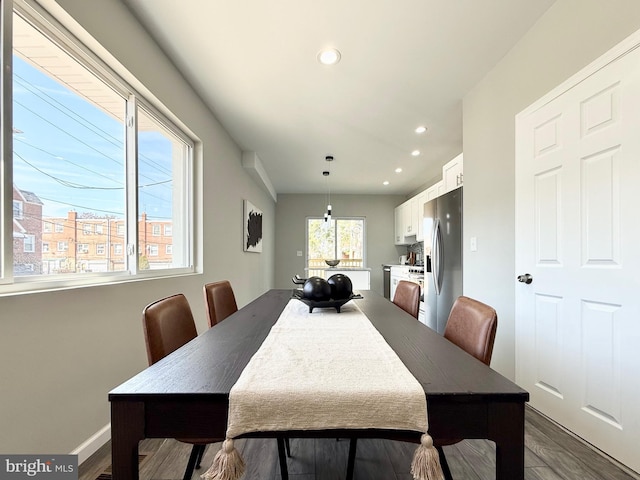 dining space featuring recessed lighting, baseboards, and dark wood-style floors