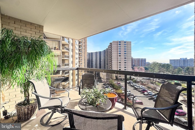 balcony featuring a view of city