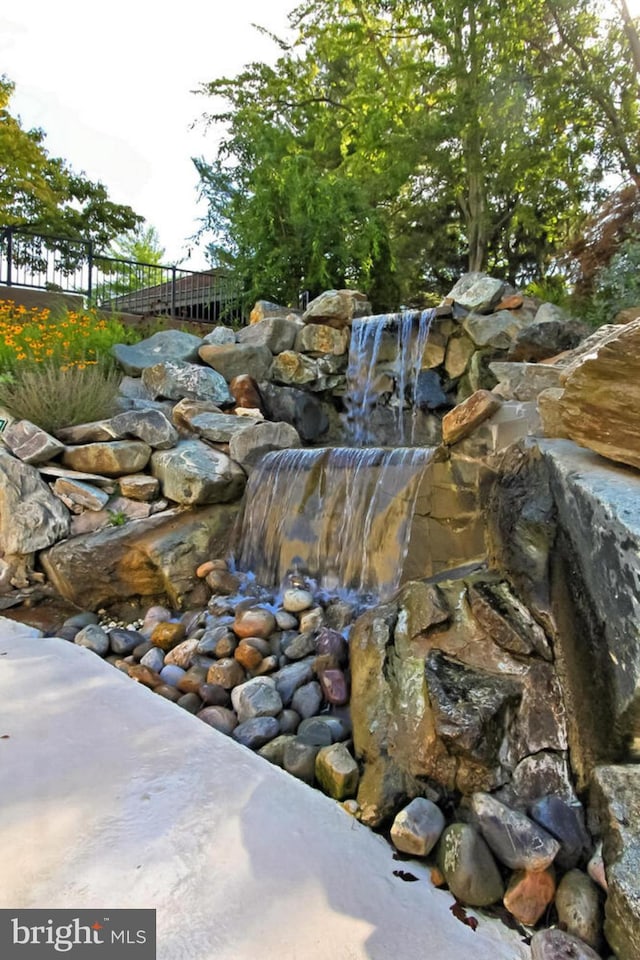 exterior details featuring fence