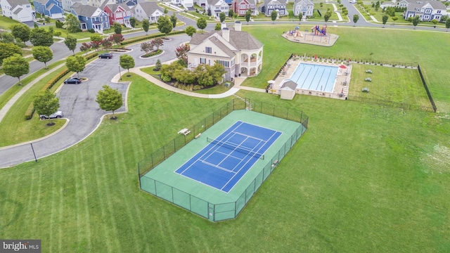 birds eye view of property with a residential view