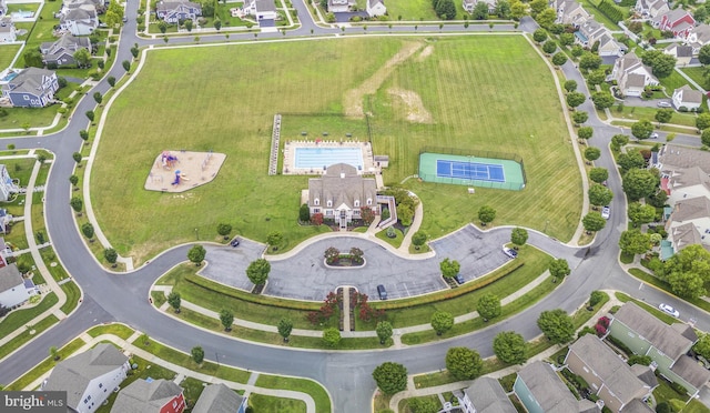 birds eye view of property with a residential view