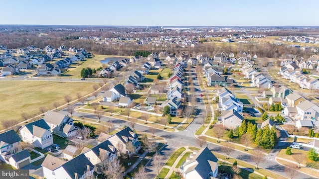 birds eye view of property with a residential view