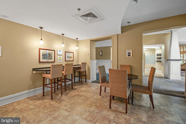 dining area with visible vents and baseboards