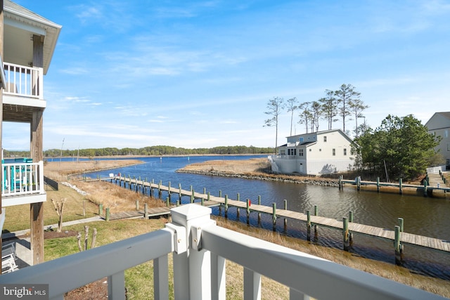 view of water feature with a dock