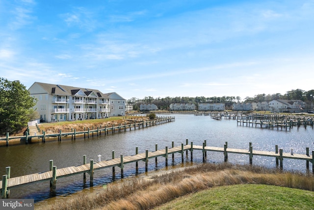 dock area featuring a water view