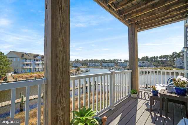 deck featuring a water view