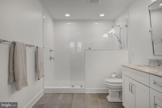 full bath with toilet, a walk in shower, recessed lighting, baseboards, and vanity