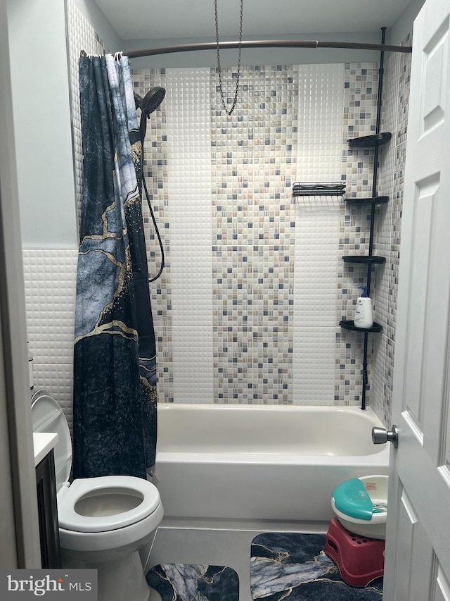 full bathroom with toilet, vanity, and shower / bath combination with curtain