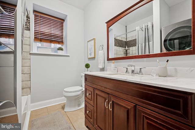 full bath featuring a shower with curtain, toilet, tile patterned flooring, baseboards, and vanity