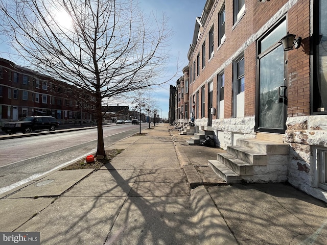 view of street featuring sidewalks and curbs