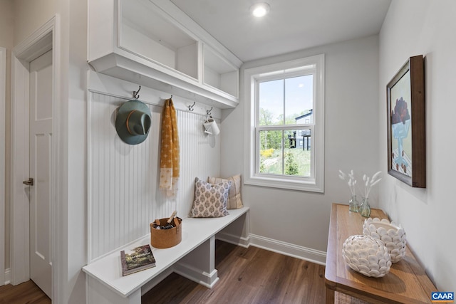 mudroom with baseboards and dark wood-style flooring