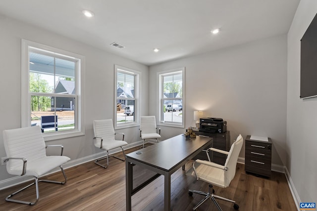 office with visible vents, recessed lighting, baseboards, and wood finished floors