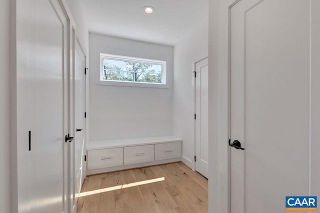 mudroom with recessed lighting and light wood-style floors