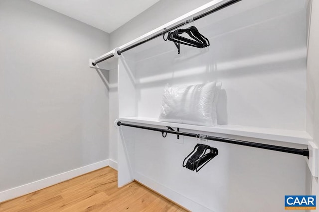 walk in closet featuring light wood-style floors