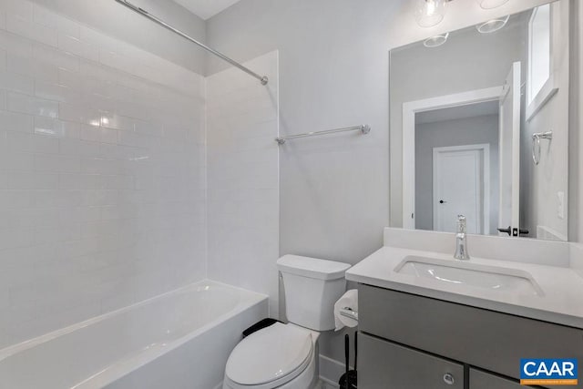 full bathroom featuring toilet, vanity, and bathtub / shower combination