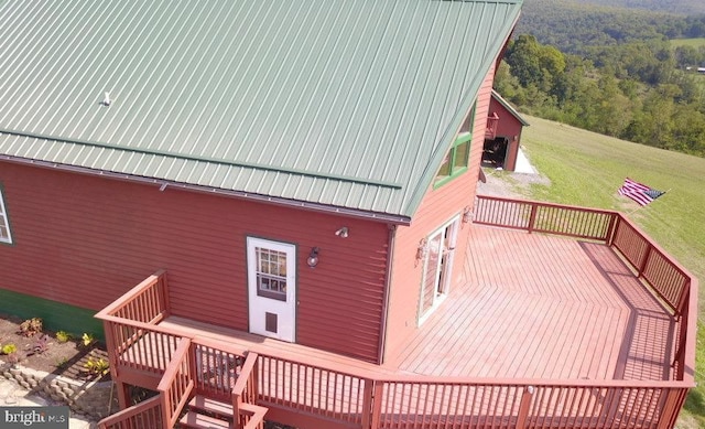 deck featuring a yard