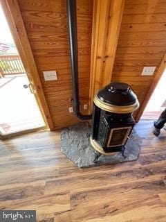 details with wooden walls and wood finished floors